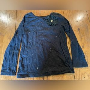 Carter’s Kid black with gold sparkles and flower shirt size 7